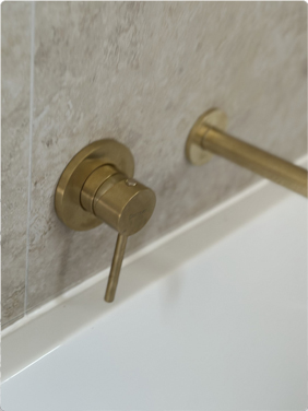 Brass wall-mounted bath mixer